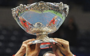 Serbian team members hold up the Davis Cup after winning the last singles Davis Cup tennis match finals between Serbia and France, at Belgrade Arena on December 5 , 2010. AFP PHOTO / DIMITAR DILKOFF (Photo credit should read DIMITAR DILKOFF/AFP/Getty Images)